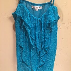 Sleeveless blue ruffle top
